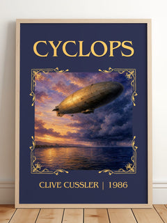 Cyclops Classic Book Art Print by Clive Cussler – framed print leaning on a wooden floor