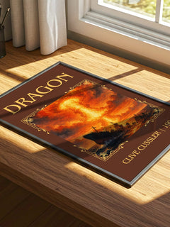 Dragon Classic Book Art Print by Clive Cussler – print on a sunlit desk