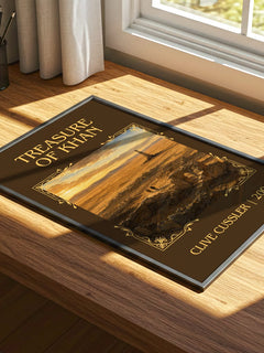 Treasure of Khan Classic Book Art Print by Clive Cussler – print on a sunlit desk