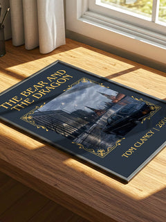 The Bear and the Dragon Classic Book Art Print by Tom Clancy – print on a sunlit desk