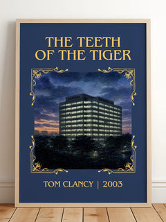 The Teeth of the Tiger Classic Book Art Print by Tom Clancy – framed print leaning on a wooden floor