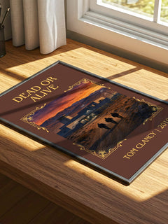 Dead or Alive Classic Book Art Print by Tom Clancy – print on a sunlit desk