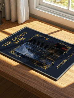 The Devil's Star Classic Book Art Print by Jo Nesbø – print on a sunlit desk