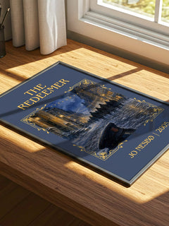 The Redeemer Classic Book Art Print by Jo Nesbø – print on a sunlit desk