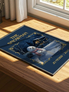 The Snowman Classic Book Art Print by Jo Nesbø – print on a sunlit desk