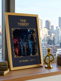 The Thirst Classic Book Art Print by Jo Nesbø – framed print on a city-view windowsill