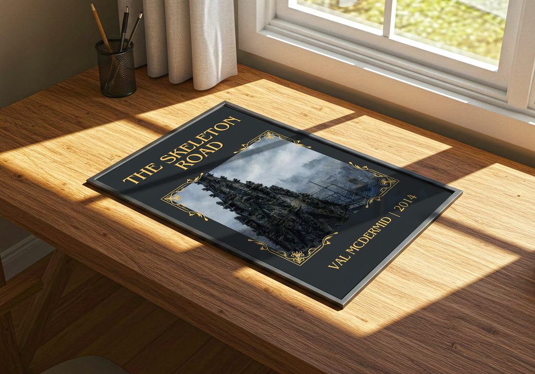 The Skeleton Road Classic Book Art Print by Val McDermid – print on a sunlit desk