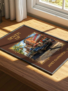 Seven Up Classic Book Art Print by Janet Evanovich – print on a sunlit desk