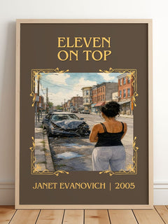 Eleven on Top Classic Book Art Print by Janet Evanovich – framed print leaning on a wooden floor