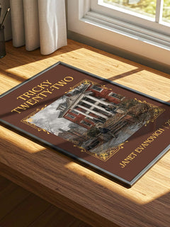 Tricky Twenty-Two Classic Book Art Print by Janet Evanovich – print on a sunlit desk