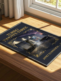 Turbo Twenty-Three Classic Book Art Print by Janet Evanovich – print on a sunlit desk