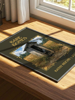 Bare Bones Classic Book Art Print by Kathy Reichs – print on a sunlit desk