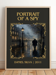 Portrait of a Spy Classic Book Art Print by Daniel Silva – framed print leaning on a wooden floor