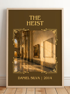 The Heist Classic Book Art Print by Daniel Silva – framed print leaning on a wooden floor