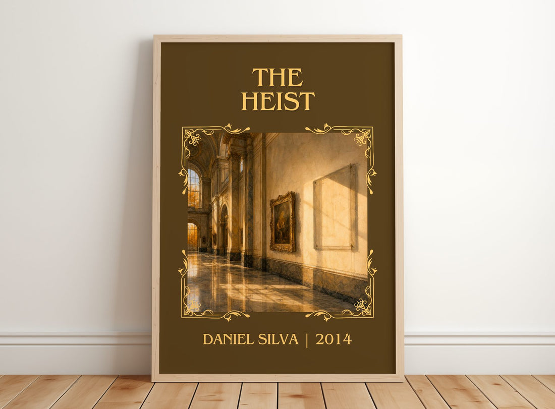 The Heist Classic Book Art Print by Daniel Silva – framed print leaning on a wooden floor