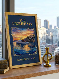 The English Spy Classic Book Art Print by Daniel Silva – framed print on a city-view windowsill