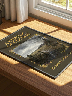 A Change of Climate Classic Book Art Print by Hilary Mantel – print on a sunlit desk