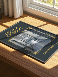 Change of Heart Classic Book Art Print by Jodi Picoult – print on a sunlit desk