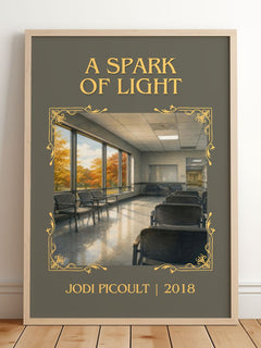 A Spark of Light Classic Book Art Print by Jodi Picoult – framed print leaning on a wooden floor