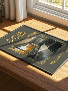 A Spark of Light Classic Book Art Print by Jodi Picoult – print on a sunlit desk