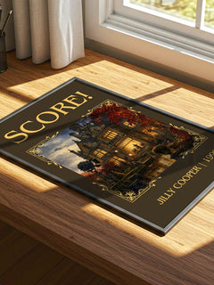 Score! Classic Book Art Print by Jilly Cooper – print on a sunlit desk