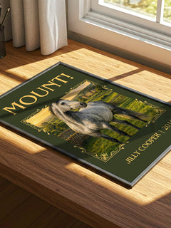 Mount! Classic Book Art Print by Jilly Cooper – print on a sunlit desk