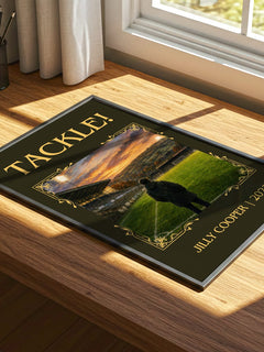 Tackle! Classic Book Art Print by Jilly Cooper – print on a sunlit desk