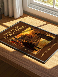 The First Man in Rome Classic Book Art Print by Colleen McCullough – print on a sunlit desk