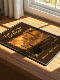 The Song of Troy Classic Book Art Print by Colleen McCullough – print on a sunlit desk