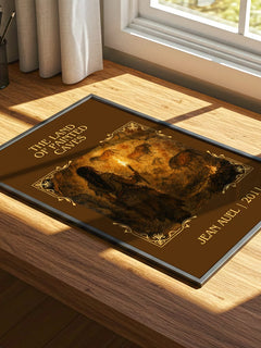The Land of Painted Caves Classic Book Art Print by Jean Auel – print on a sunlit desk