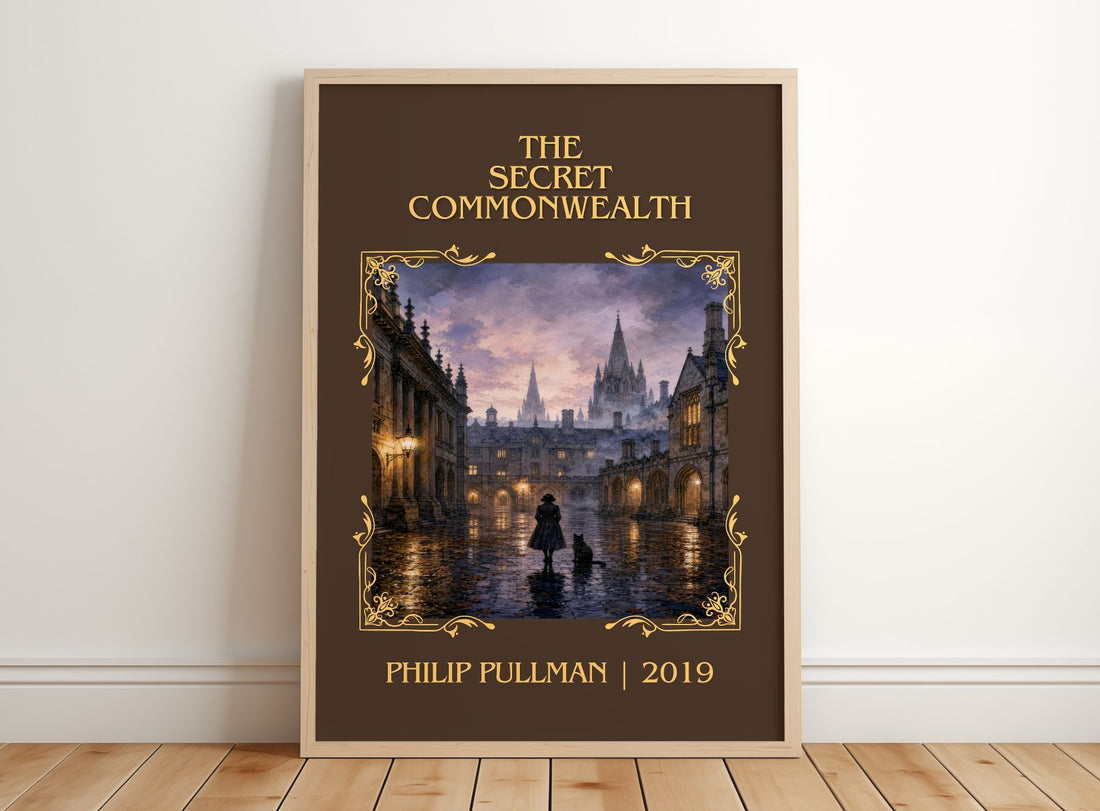 The Secret Commonwealth Classic Book Art Print by Philip Pullman – framed print leaning on a wooden floor