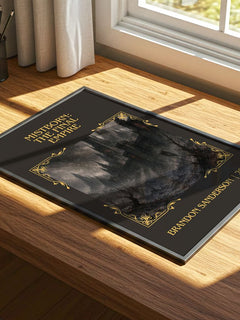 Mistborn: The Final Empire Classic Book Art Print by Brandon Sanderson – print on a sunlit desk