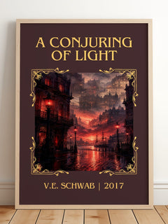 A Conjuring of Light Classic Book Art Print by V.E. Schwab – framed print leaning on a wooden floor