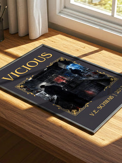 Vicious Classic Book Art Print by V.E. Schwab – print on a sunlit desk