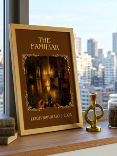 The Familiar Classic Book Art Print by Leigh Bardugo – framed print on a city-view windowsill
