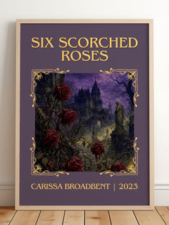 Six Scorched Roses Classic Book Art Print by Carissa Broadbent – framed print leaning on a wooden floor