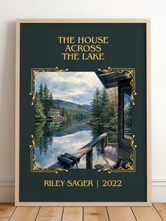 The House Across the Lake Classic Book Art Print by Riley Sager – framed print leaning on a wooden floor