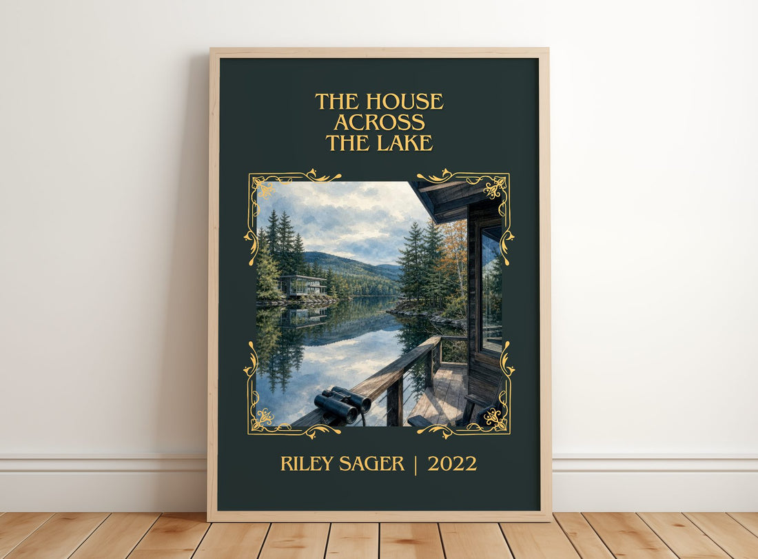 The House Across the Lake Classic Book Art Print by Riley Sager – framed print leaning on a wooden floor