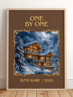 One by One Classic Book Art Print by Ruth Ware – framed print leaning on a wooden floor