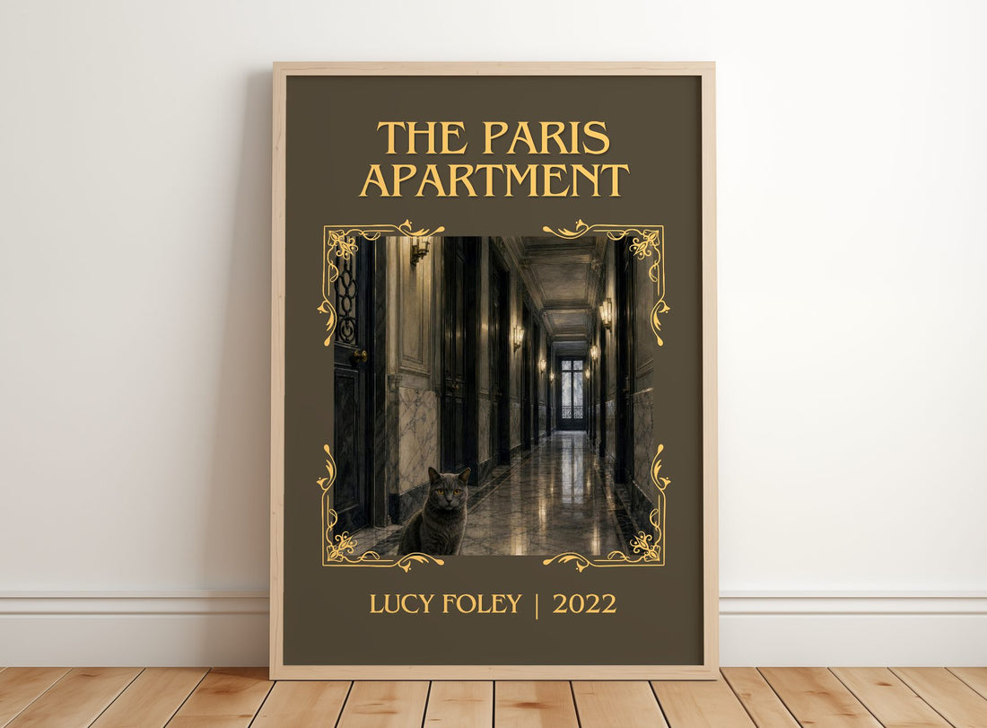 The Paris Apartment Classic Book Art Print by Lucy Foley – framed print leaning on a wooden floor