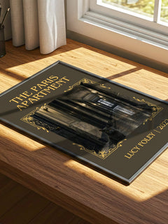 The Paris Apartment Classic Book Art Print by Lucy Foley – print on a sunlit desk