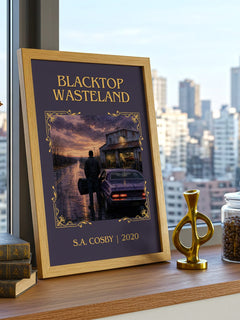 Blacktop Wasteland Classic Book Art Print by S.A. Cosby – framed print on a city-view windowsill