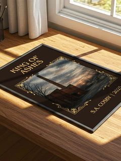 King of Ashes Classic Book Art Print by S.A. Cosby – print on a sunlit desk