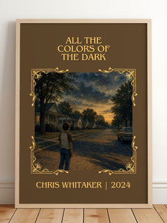 All the Colors of the Dark Classic Book Art Print by Chris Whitaker – framed print leaning on a wooden floor