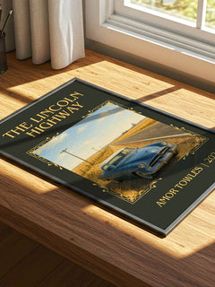 The Lincoln Highway Classic Book Art Print by Amor Towles – print on a sunlit desk