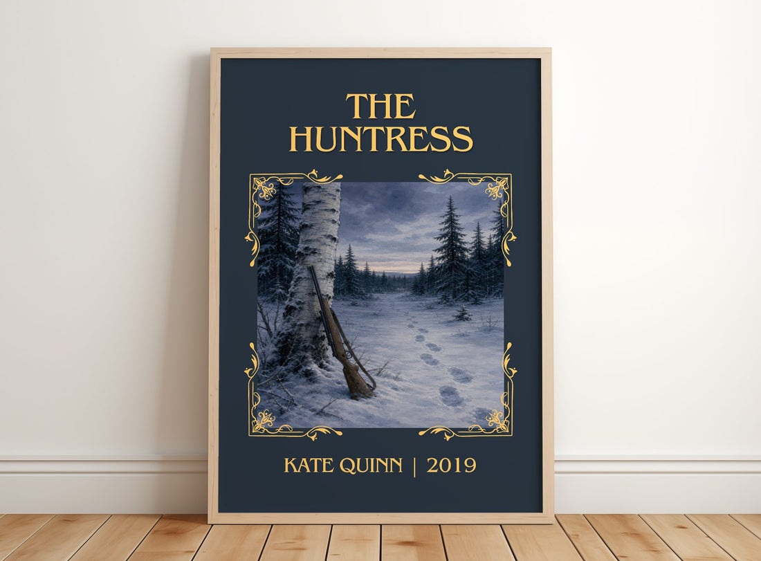 The Huntress Classic Book Art Print by Kate Quinn – framed print leaning on a wooden floor