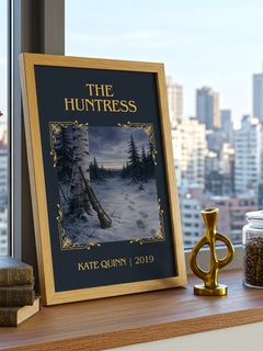 The Huntress Classic Book Art Print by Kate Quinn – framed print on a city-view windowsill