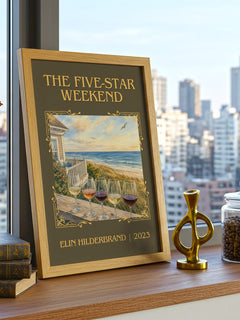 The Five-Star Weekend Classic Book Art Print by Elin Hilderbrand – framed print on a city-view windowsill