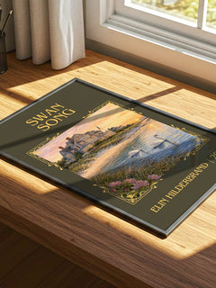 Swan Song Classic Book Art Print by Elin Hilderbrand – print on a sunlit desk