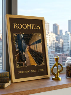 Roomies Classic Book Art Print by Christina Lauren – framed print on a city-view windowsill